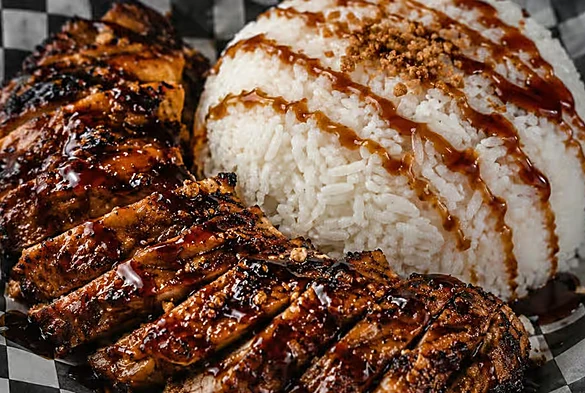 Inihaw na baka grilled beef with rice packed for takeout from Kalan Restaurant in Winnipeg