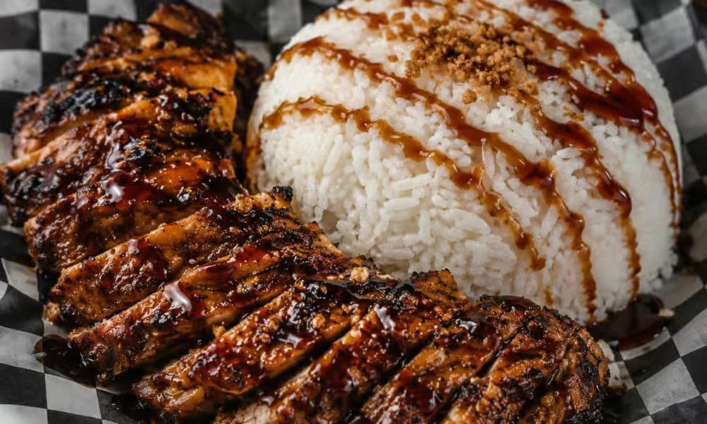 Inihaw na baka grilled marinated beef sliced over steamed rice with savoury sauce at Kalan At Night, 1449 Arlington Street, Winnipeg